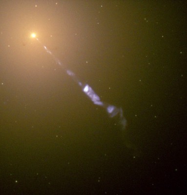 The jet emerging from the galactic core of **M87** (**NGC 4486**). The jet extends to about **5000 light years**. The data used in this image was collected with **Hubble's Wide Field Planetary Camera 2** in **1998** by **J.A. Biretta**, **W.B. Sparks**, **F.D. Macchetto**, and **E.S. Perlman** (**STScI**). This composite image was compiled by the **Hubble Heritage** team based on these exposures of *ultraviolet*, *blue*, *green*, and *infrared* light.